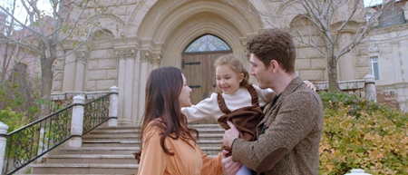 A picture containing clothing, person, outdoor, kiss

Description automatically generated