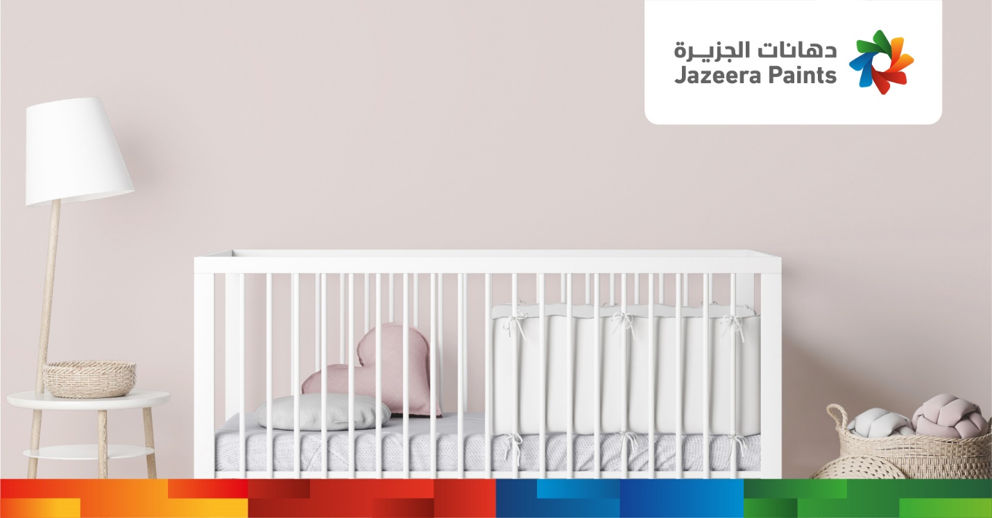 A crib with a white crib and colorful squares

Description automatically generated